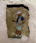 Danny Lanka at work inside tomb 121 (click to open)